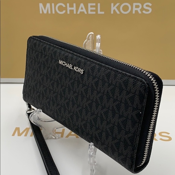 MK Jet Set Travel Continental PVC Signature Zip - Picture 10 of 16